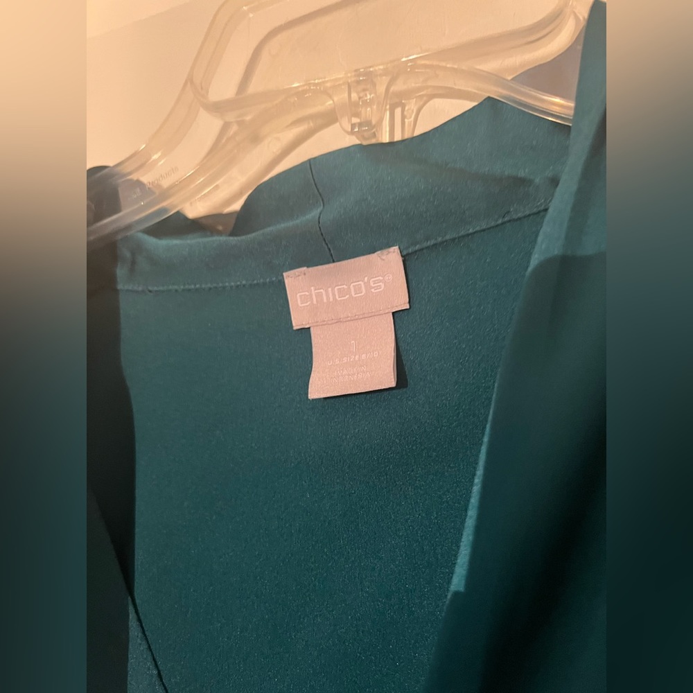 Beautiful teal blouse.